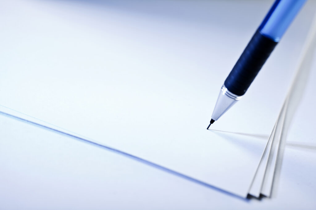 pen writing on paper